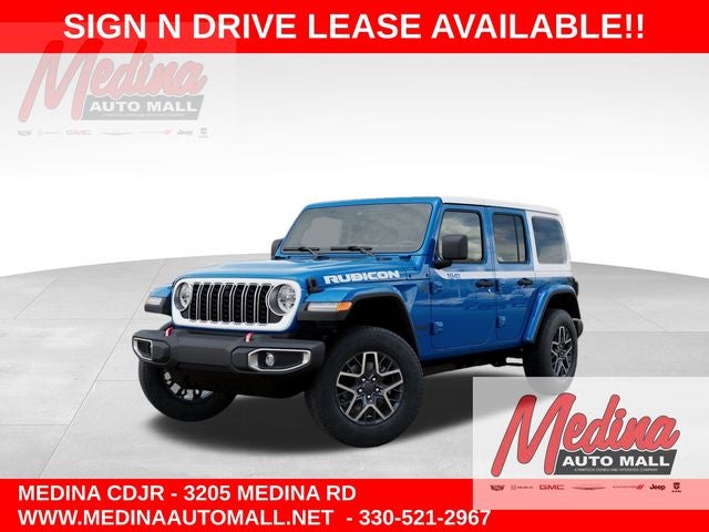 2026 Jeep Wrangler Sahara in Hydro Blue Pearl-Coat Exterior Paint — front three-quarter view