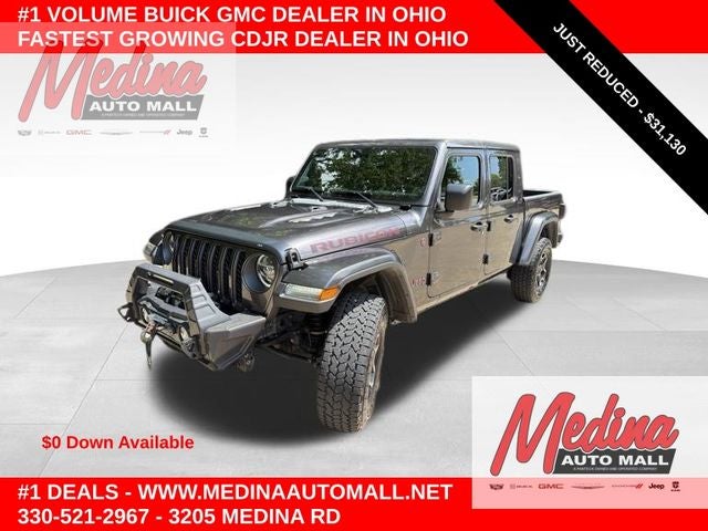 2021 Jeep Gladiator Rubicon in Granite Crystal Metallic Clearcoat — front three-quarter view