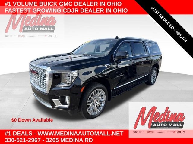 2024 GMC Yukon XL Denali in Onyx Black — front three-quarter view