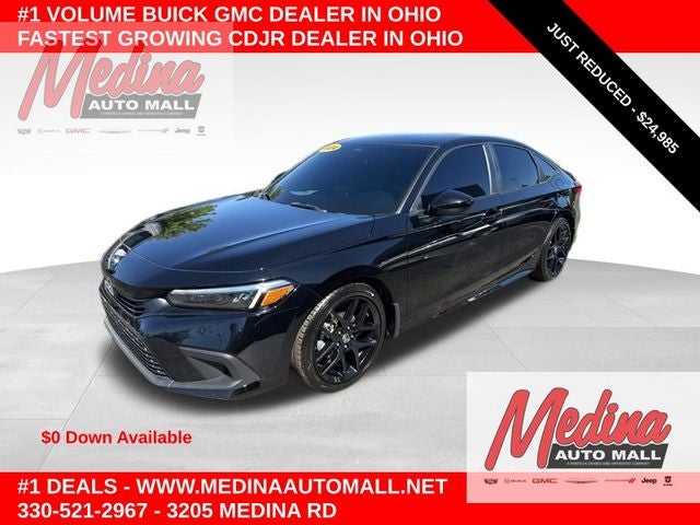2024 Honda Civic Sport in Crystal Black Pearl — front three-quarter view