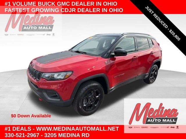 2023 Jeep Compass Trailhawk in Redline Pearlcoat — front three-quarter view
