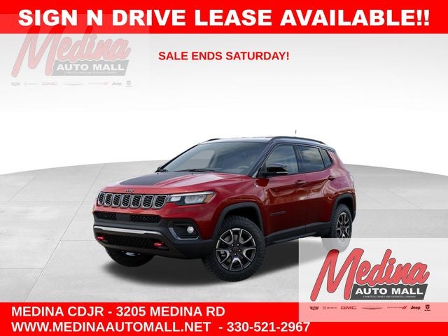2026 Jeep Compass Trailhawk in Red Hot Pearl-Coat Exterior Paint — front three-quarter view