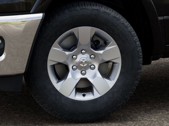 2026 RAM 1500 Big Horn/Lone Star in Diamond Black Crystal Pearl-Coat Exterior Paint — front three-quarter view